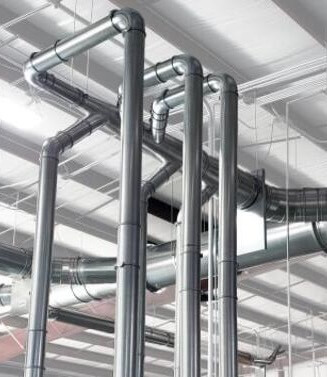 Nordfab ductwork installed in an industrial facility to improve dust collection and removal.